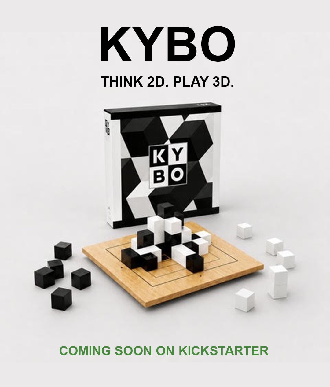 The KYBO box standing behind its wooden board, with black and white cubes stacked on the playing surface.